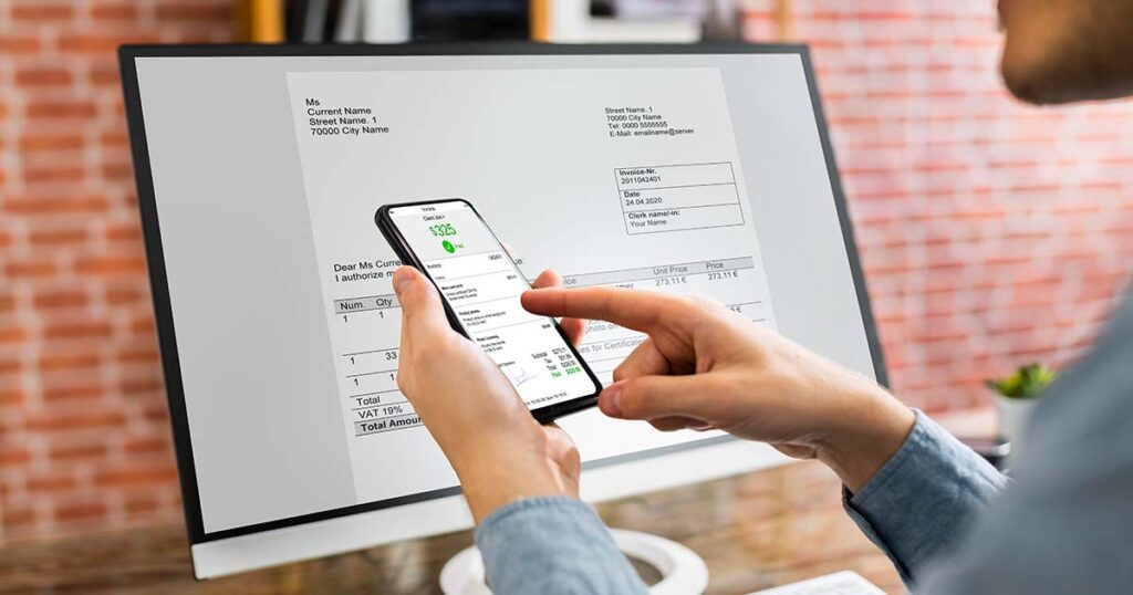 Une PME gérant ses factures électroniques via une plateforme de dématérialisation